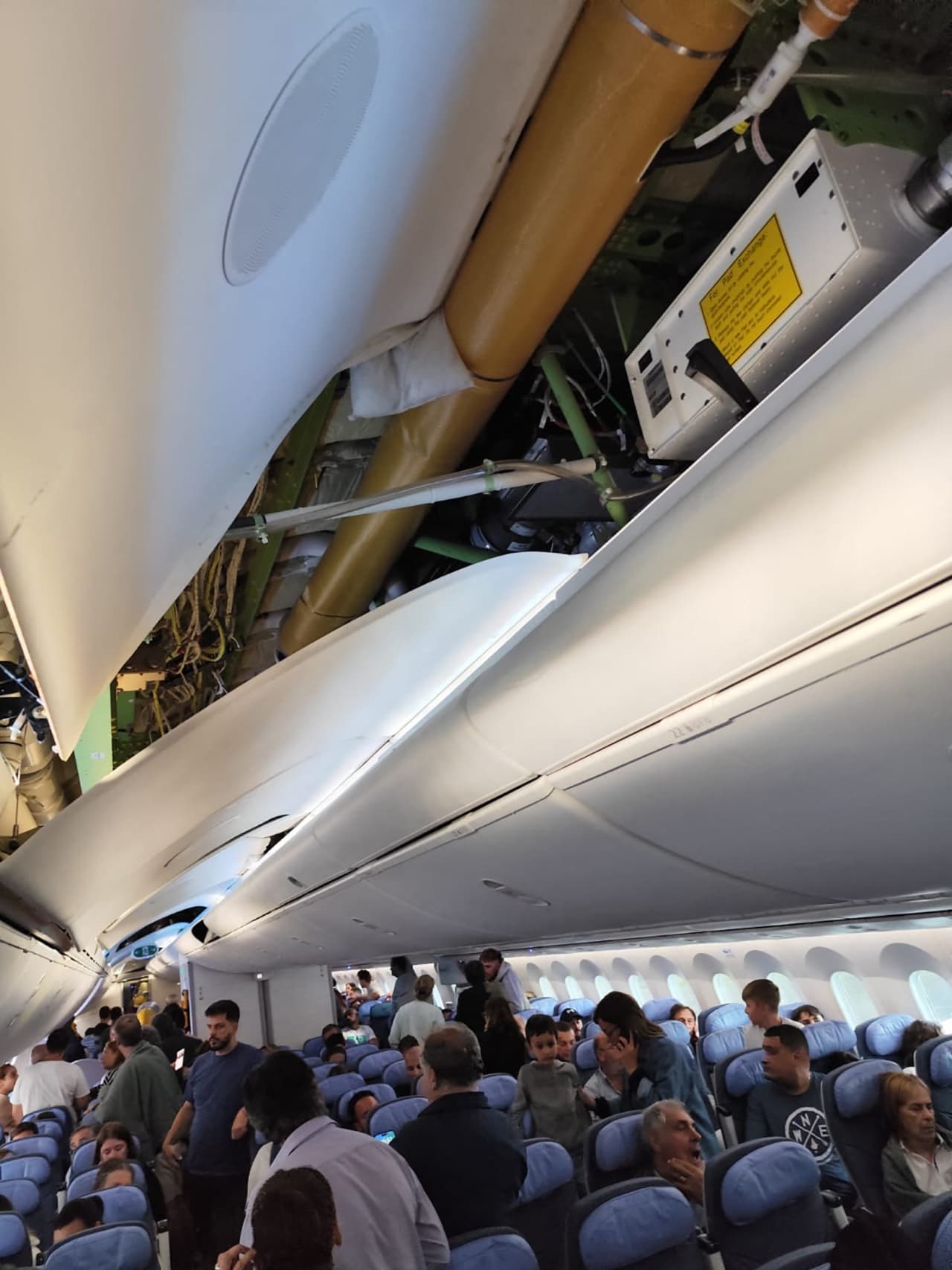 At least 30 injured after flight hits turbulence — sending man into overhead bin