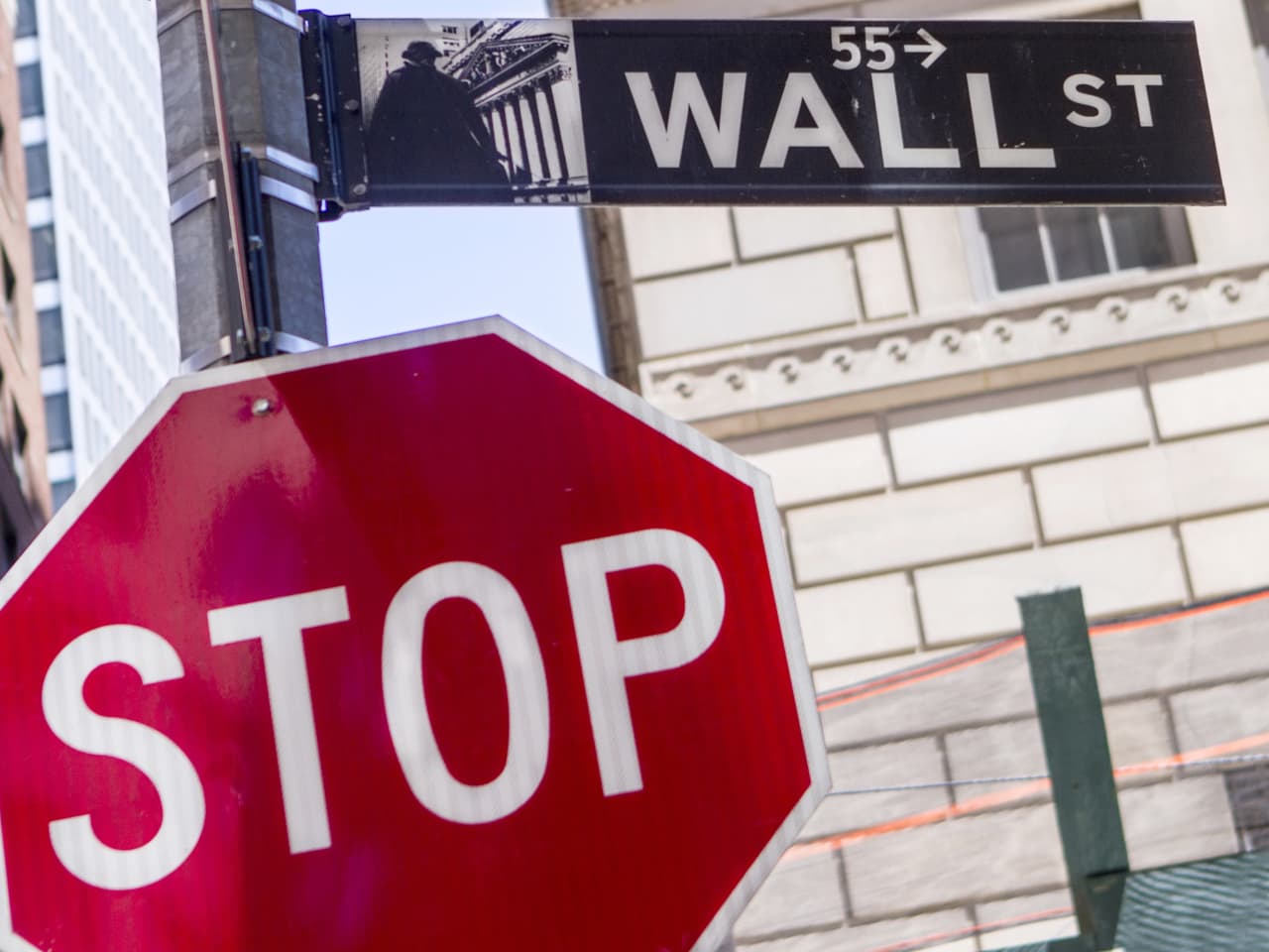 Dow drops below a key chart level, warning of more trouble ahead