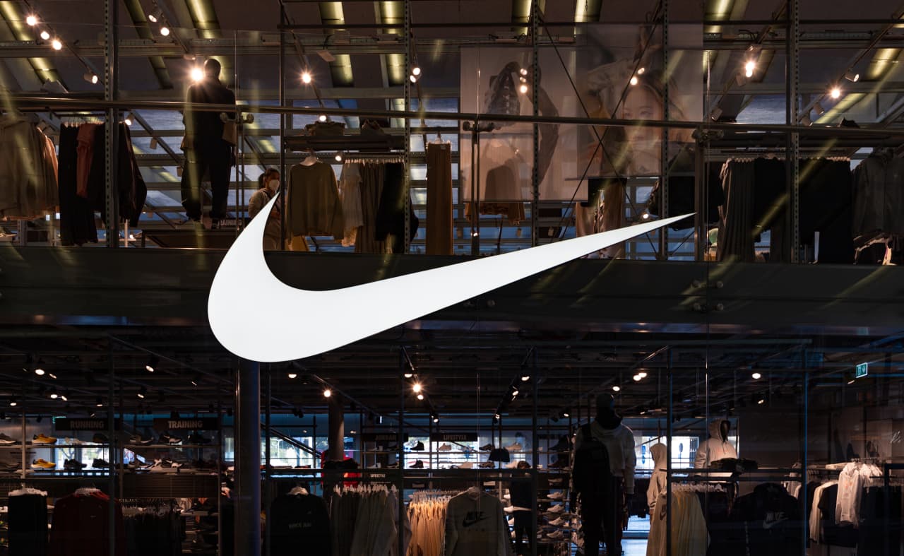 Nike CEO joins Tim Cook in betting his own money that the stock is bottoming