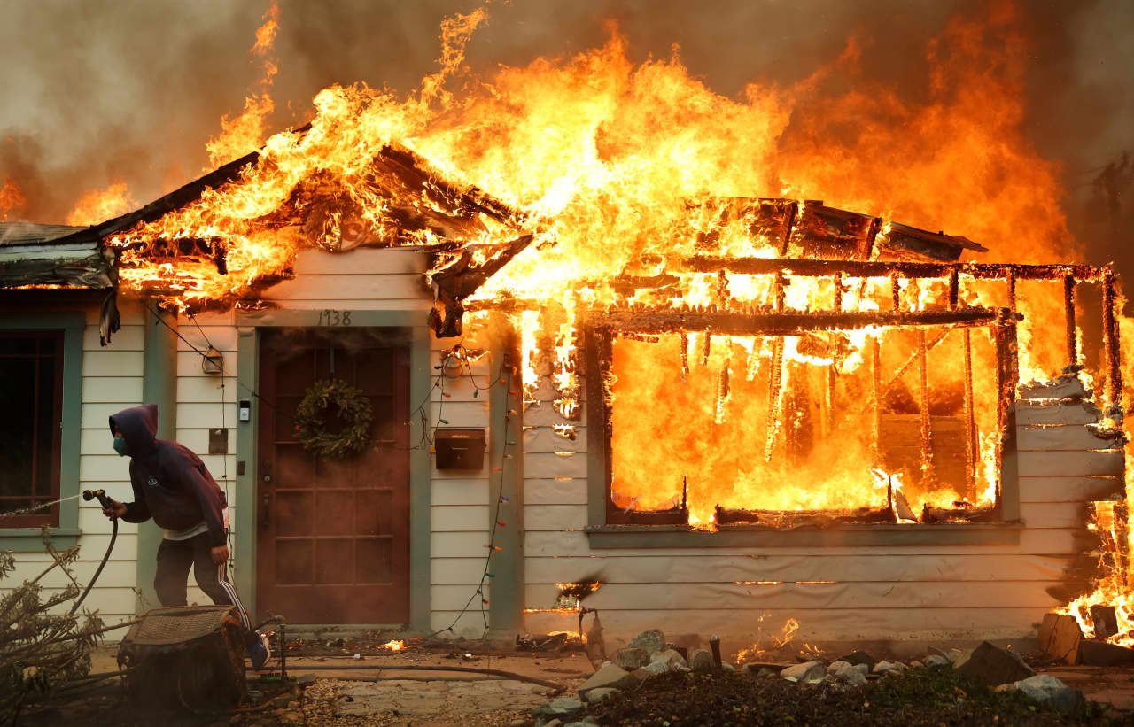 CEO of Los Angeles-based home builder says rebuilding will take a long time