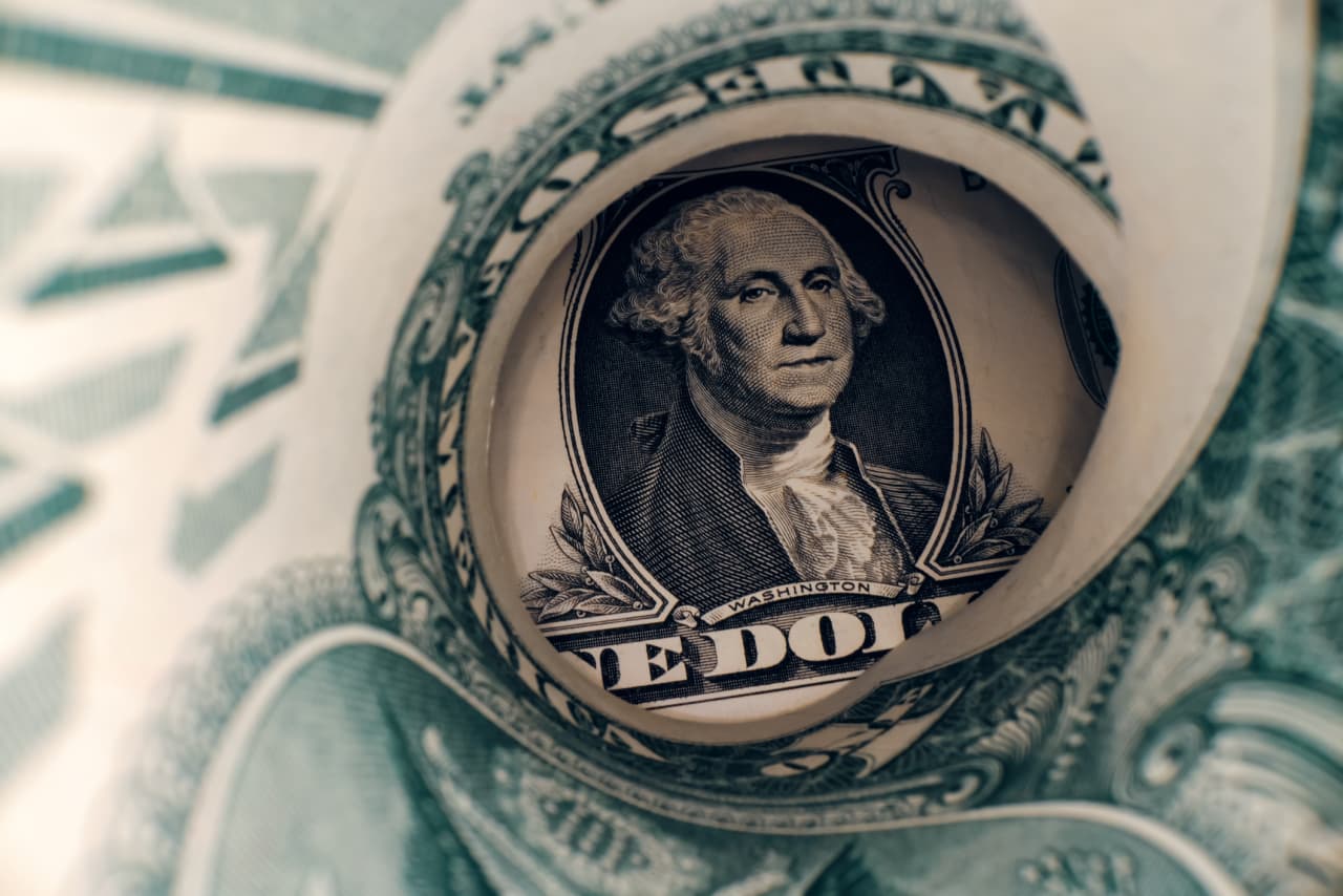 Dollar tumbles to a four-year low as Trump claims it’s ‘doing great’