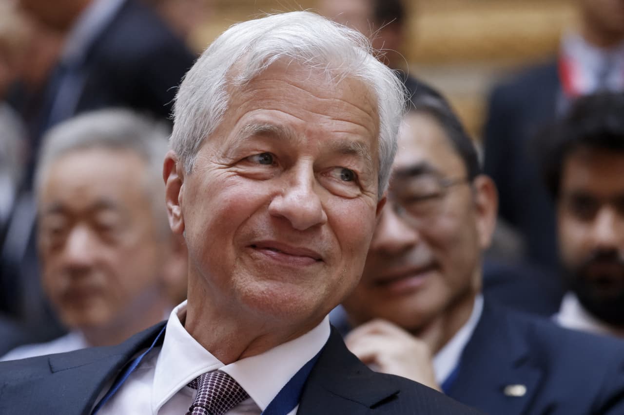Jamie Dimon sees ‘happy talk’ driving markets as he maintains cautious view
