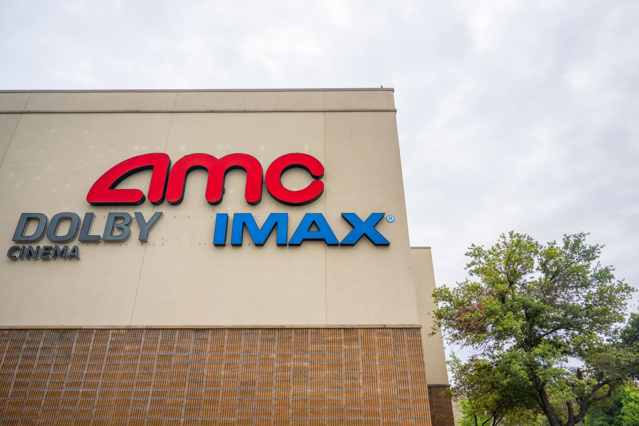 AMC’s stock rises as movie-theater chain shaves almost $153 million off