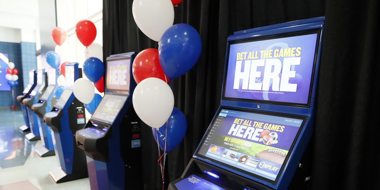 William Hill surges on deal talk as London...