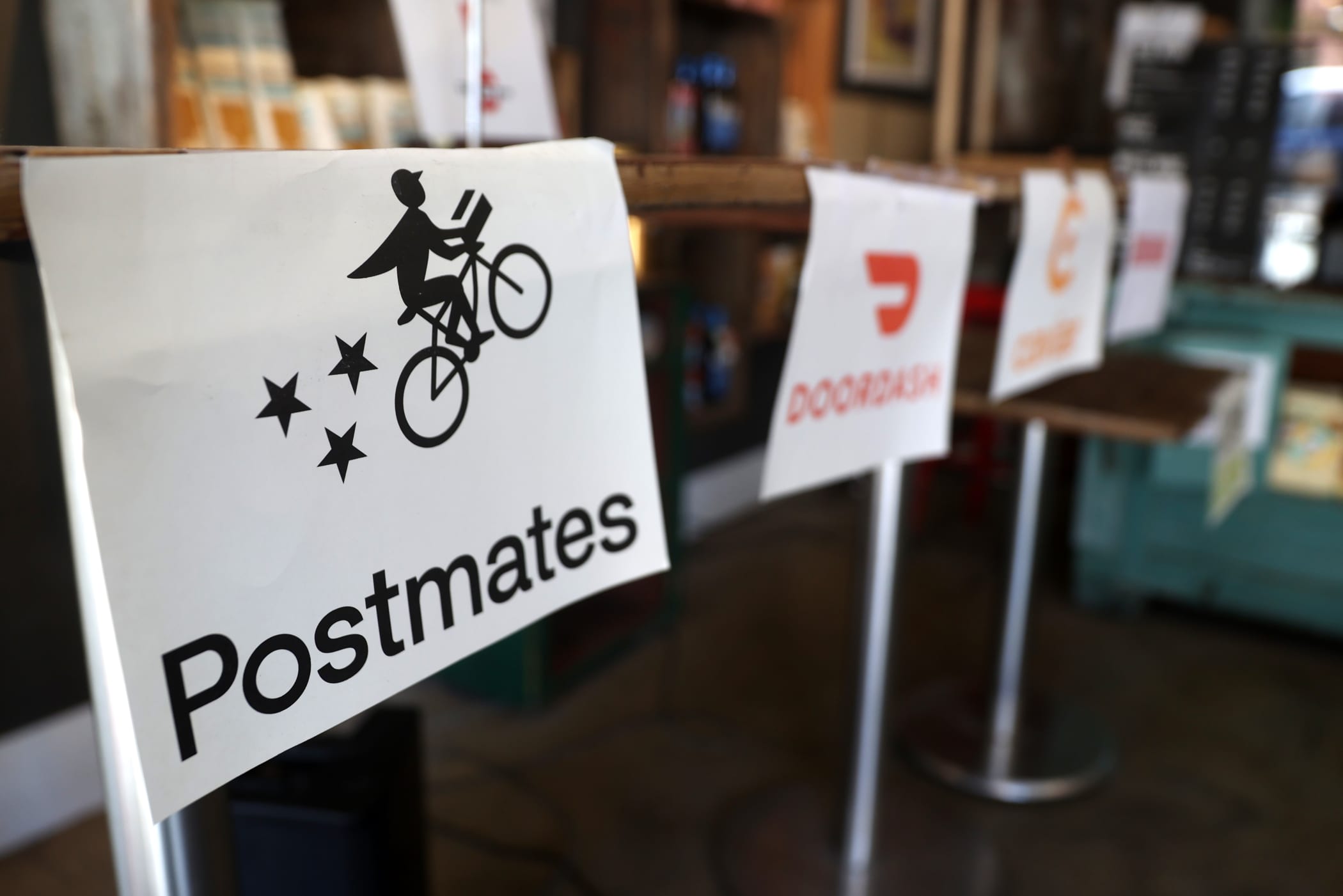 Cut losses. Курьер Postmates. Postmates. Postmates delivery. Postmates logo.