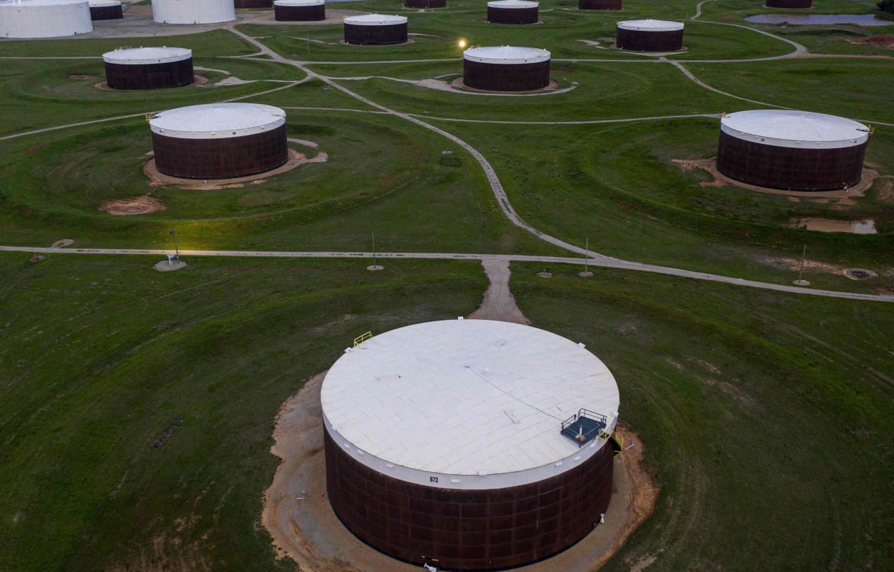 Oil prices end lower, with weekly U.S. crude supply up over 3 million barrels