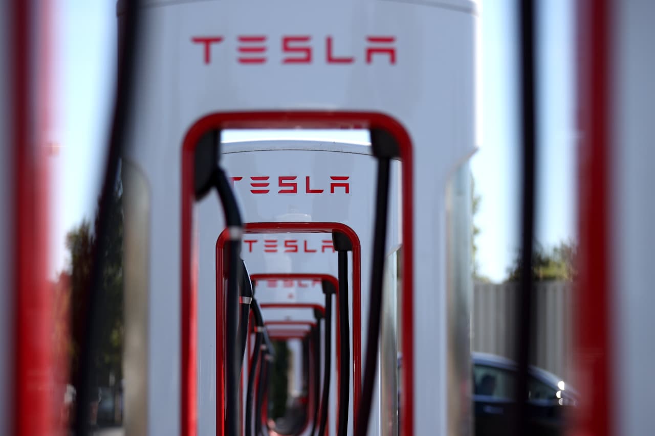 Tesla shares fall amid reports that Supercharger unit slashed
