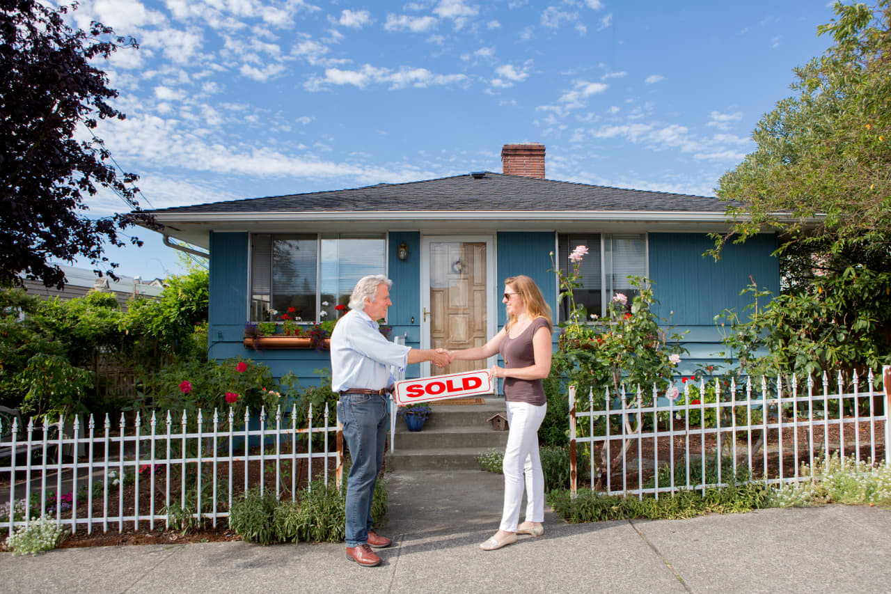 Mortgage rates fall, providing some relief to home buyers