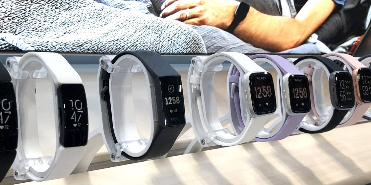 fitbit acquired by alphabet