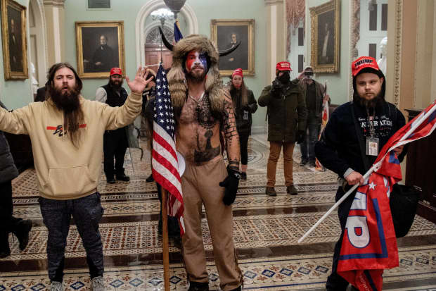 Jake Angeli Capitol Rioter In Horned Helmet Arrested By Feds Marketwatch