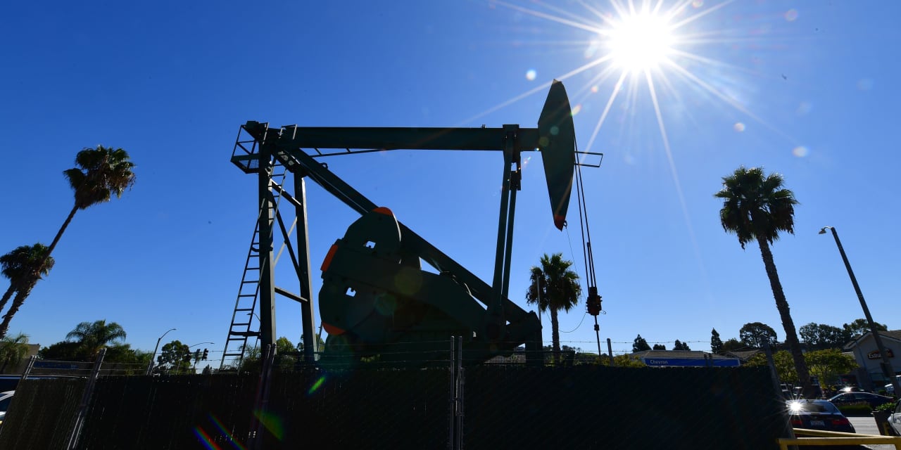 Oil prices extend gains, amid slow yields in Texas production, a broader commodity rally