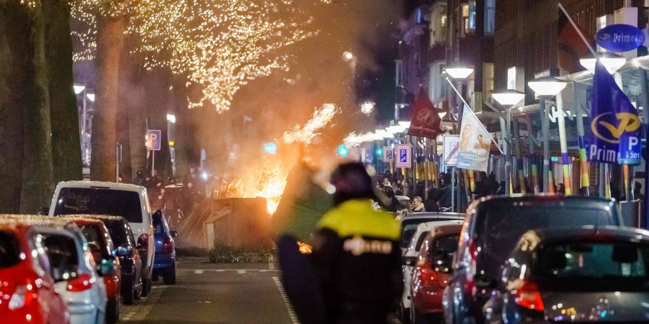 Riots and looting in Dutch cities as curfew is imposed to slow ...