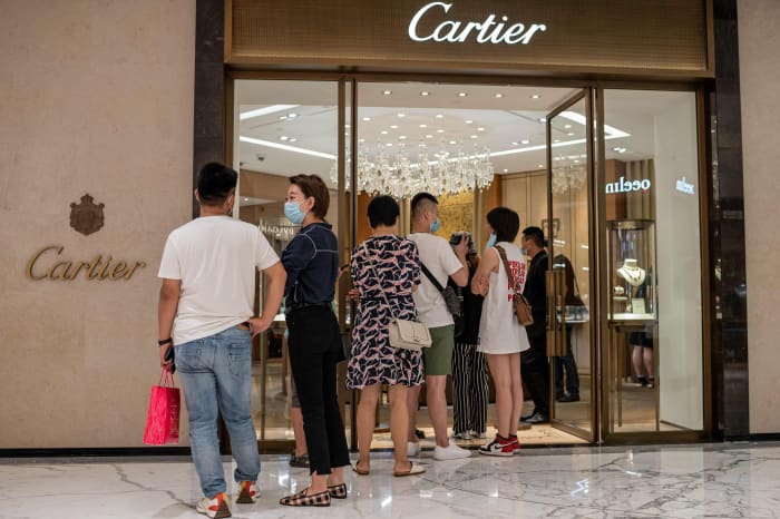 Richemont shares surge following boom in Cartier owner s sales to