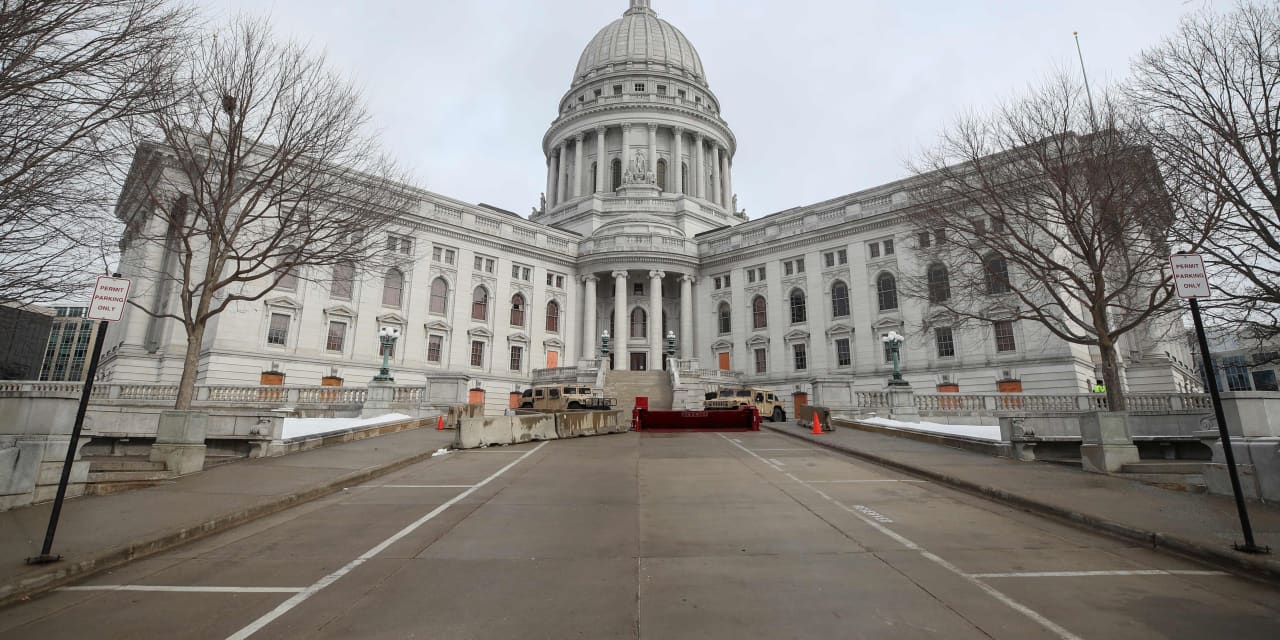 Man with handgun arrested at Wisconsin state capitol approached office of Democratic governor Evers - Vimarsana News