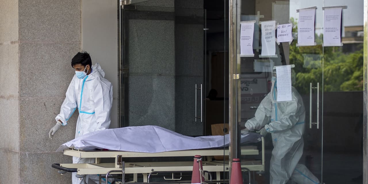 India set a global record of more than 300,000 daily infections on Thursday
