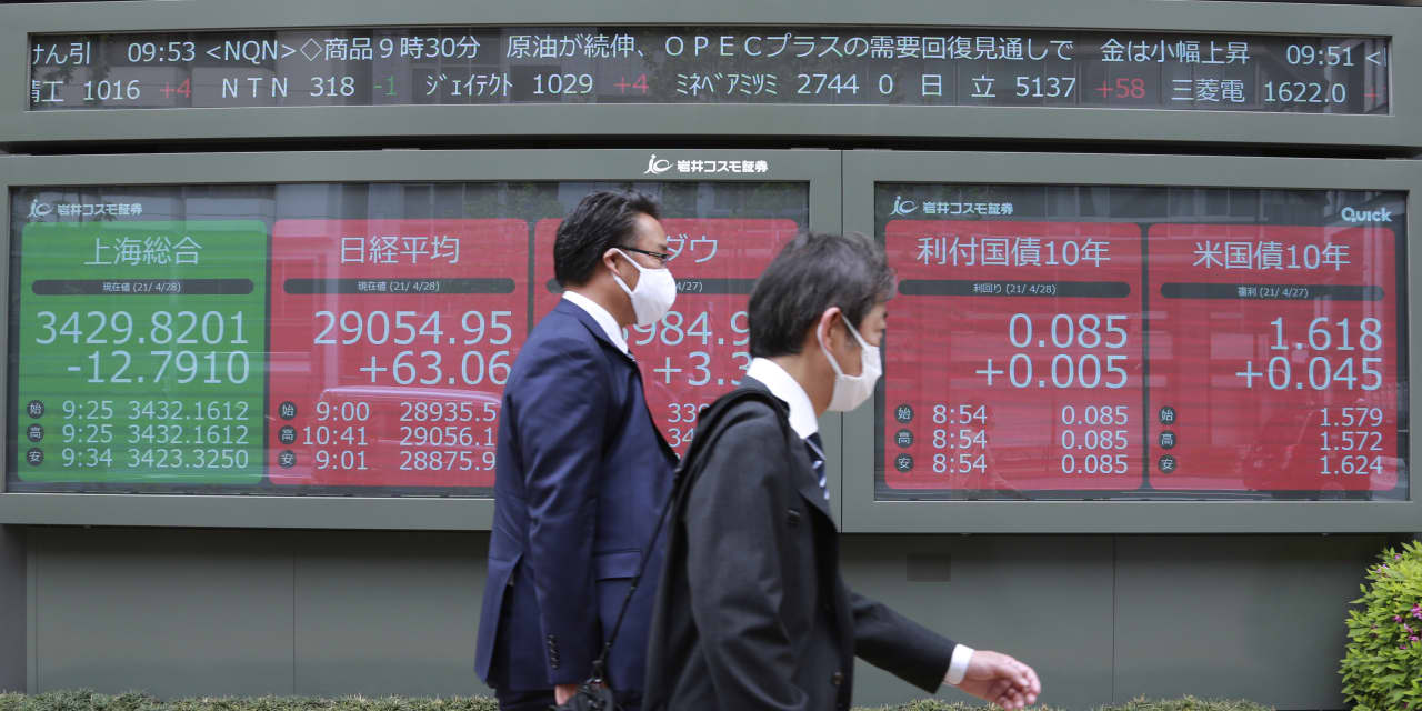 Asian markets mostly higher ahead of Fed meeting