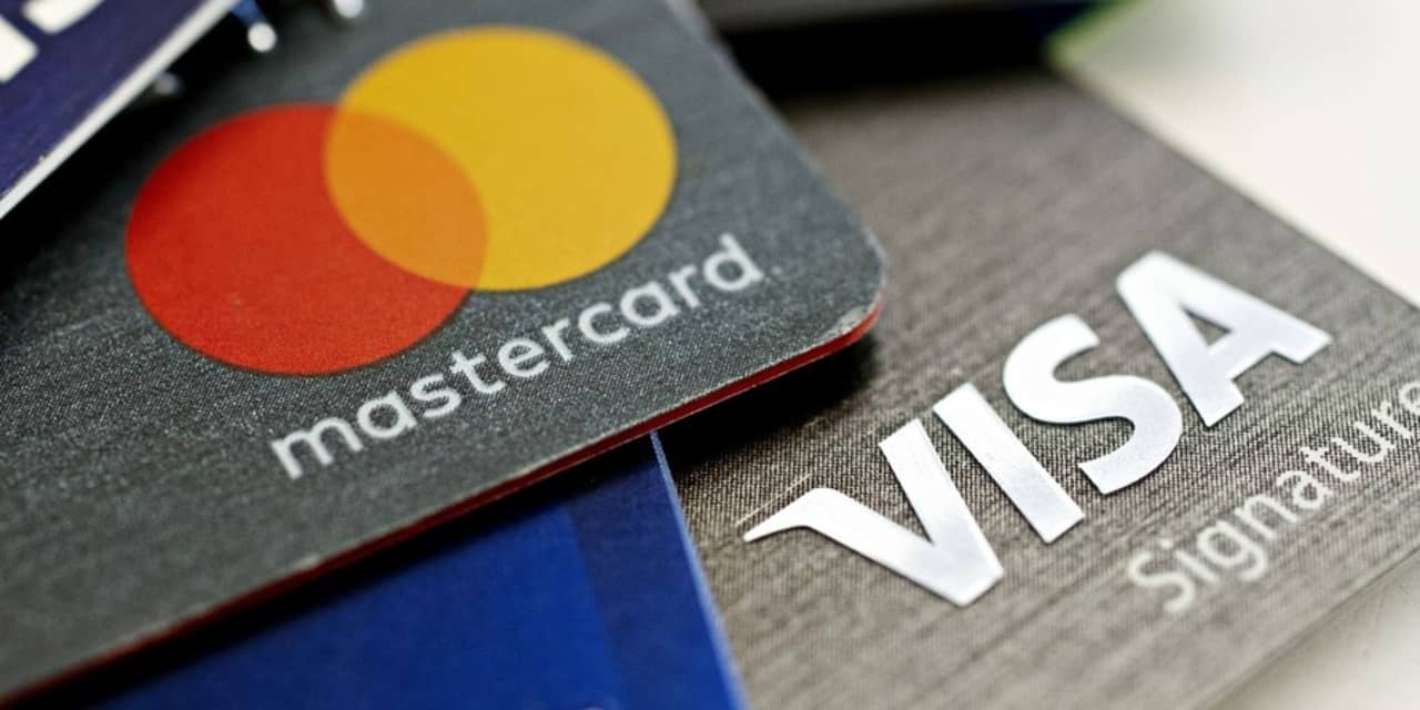 #: Visa, Mastercard say they will suspend Russia operations