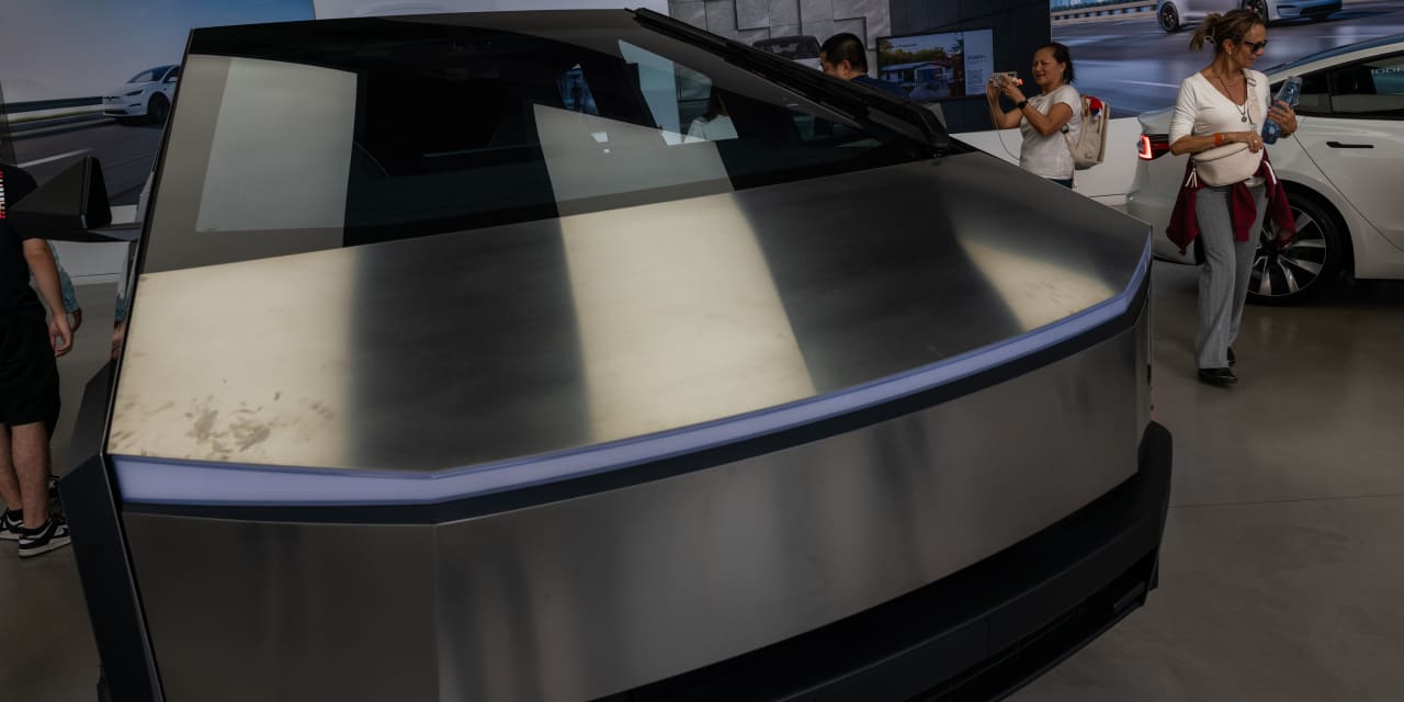 Tesla’s market cap tops $1 trillion after another Trump-fueled jump for ...
