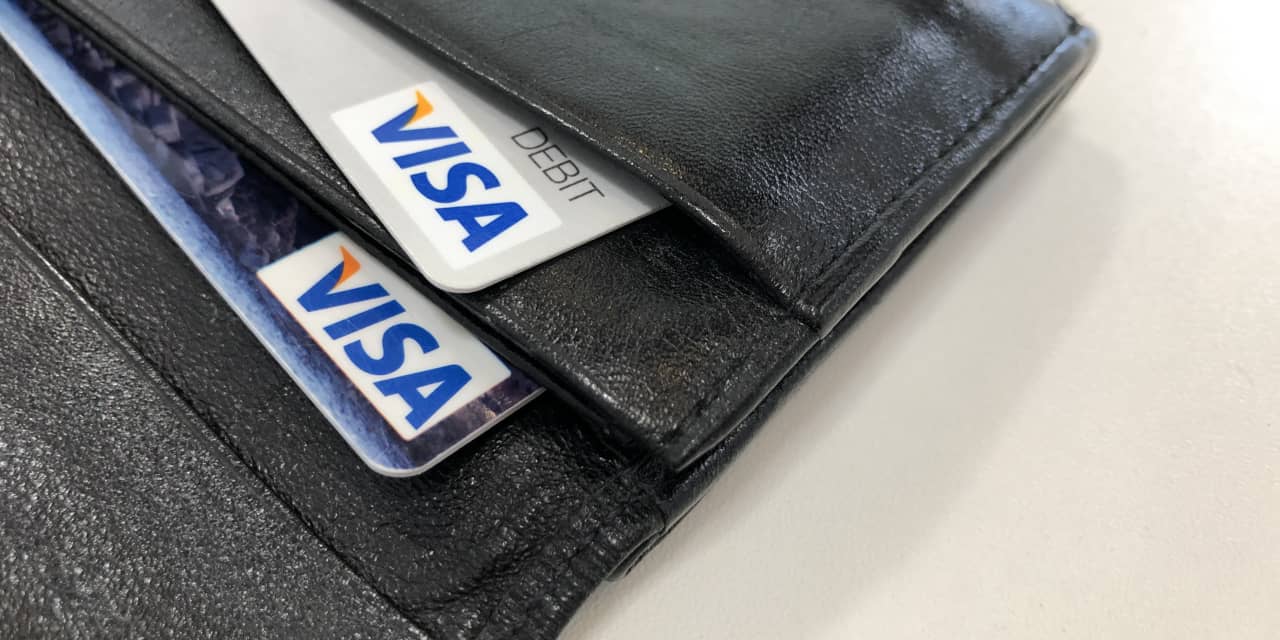 Visa tops earnings expectations, boosts dividend