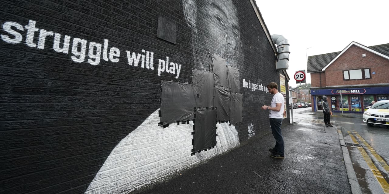 Police open probe as three England players who missed penalties in loss to Italy face racist abuse