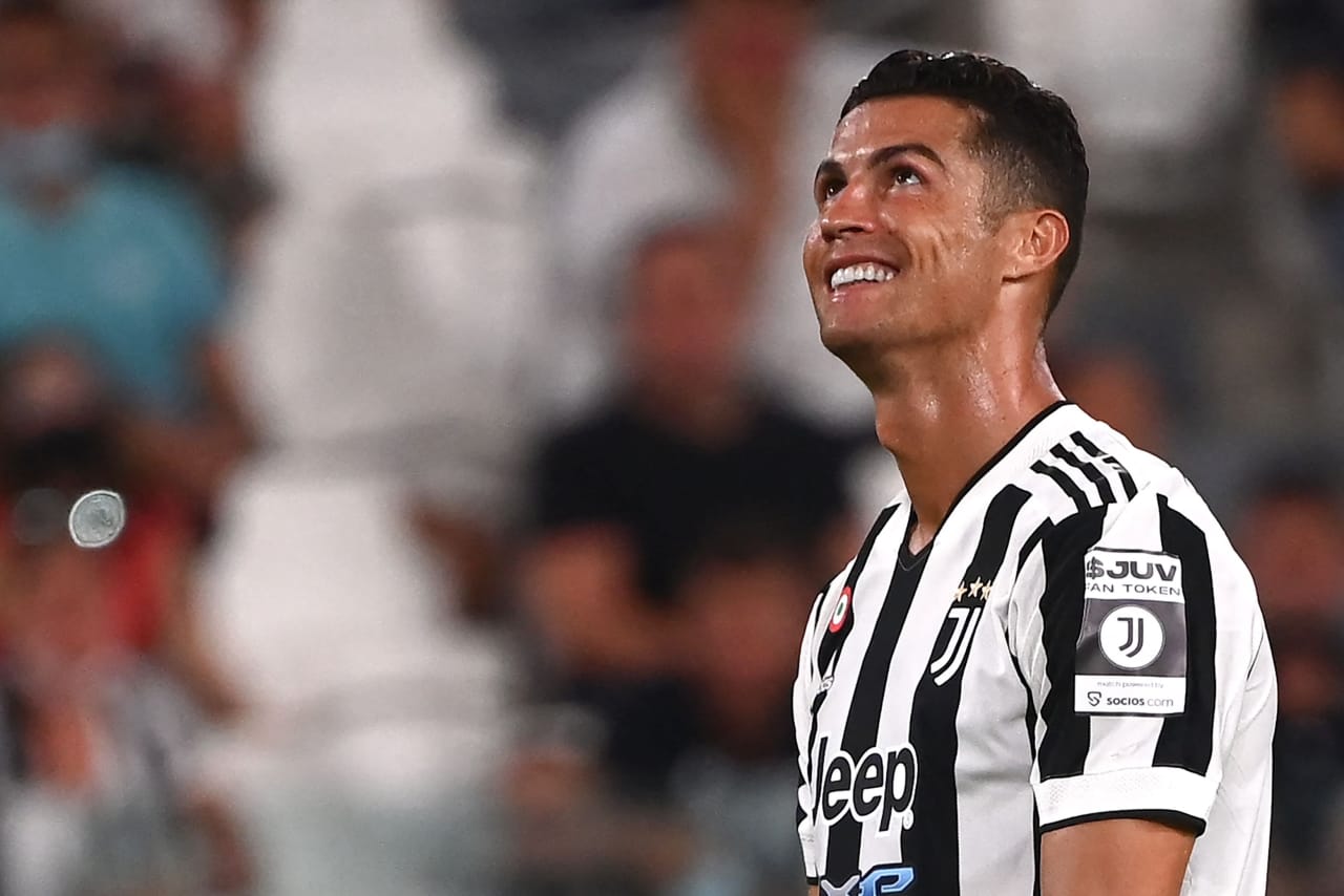 Cristiano Ronaldo of Juventus FC holds a jersey with the number 700 News  Photo - Getty Images