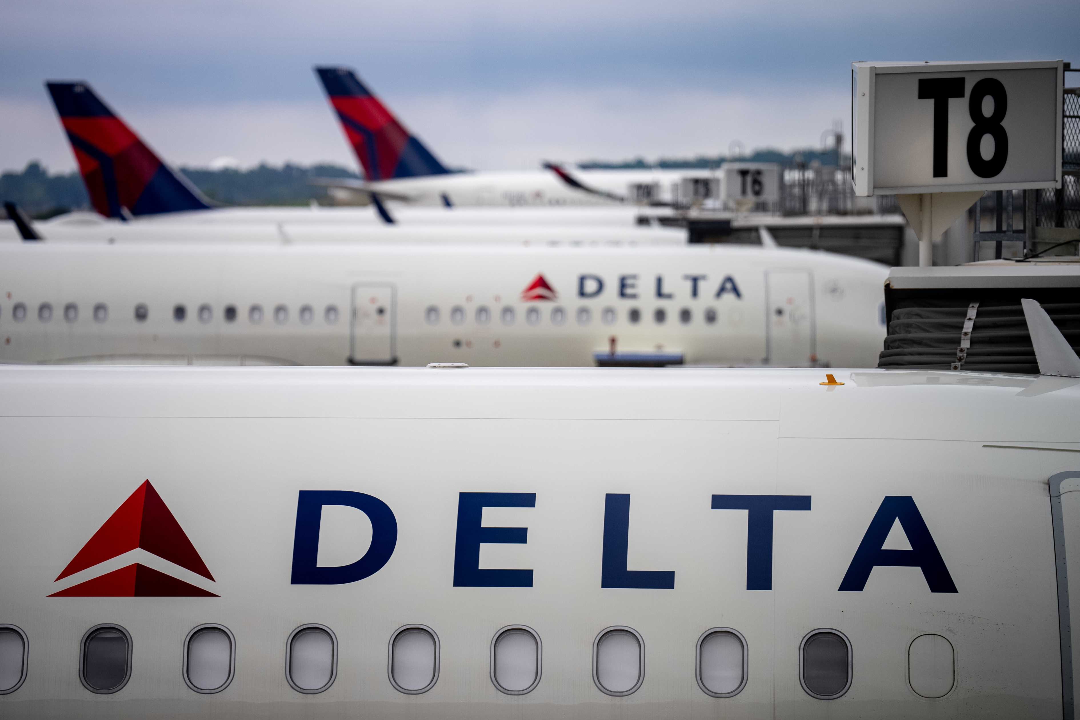 Delta Air Lines planes at an airport.