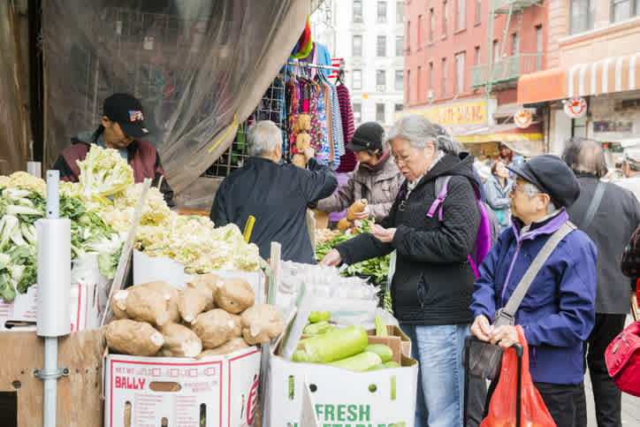 A third of Asian Americans who live in poverty have college degrees. What’s going on?