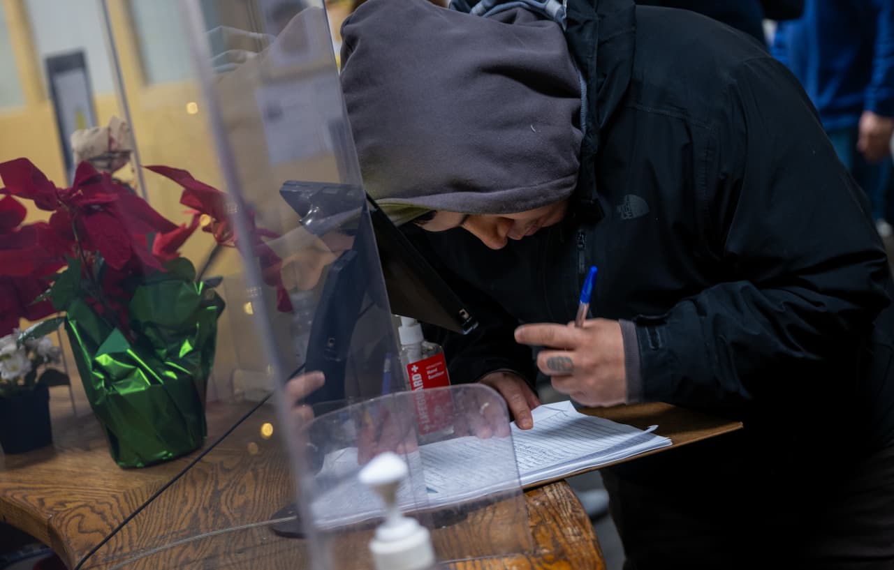 Jobless claims — aka layoffs — fall below key 200,000 threshold. Labor market may be improving.