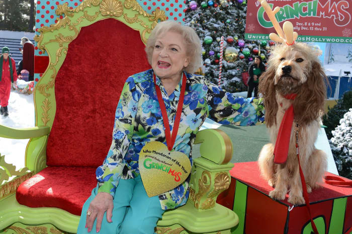 Betty White with dog at holiday time