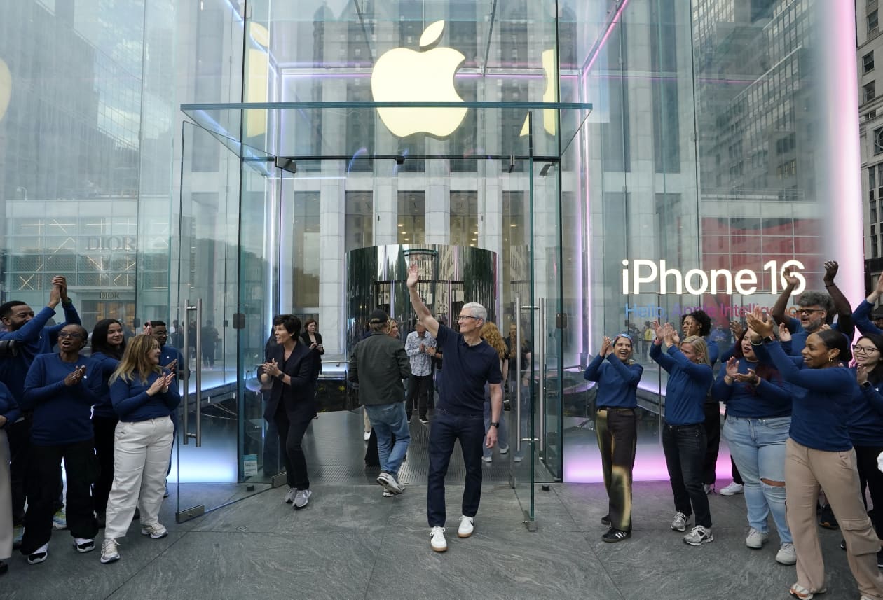 Apple’s stock closes in on record high after upbeat call on iPhone