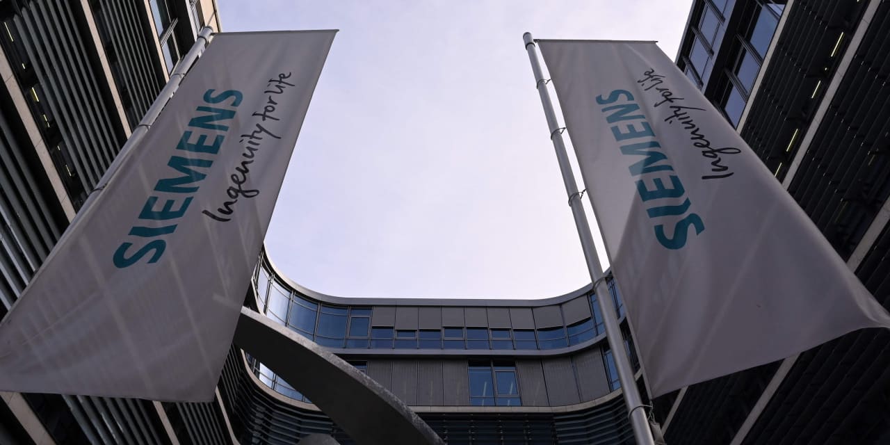 #Dow Jones Newswires: Siemens cuts outlook after swinging to .71 billion loss