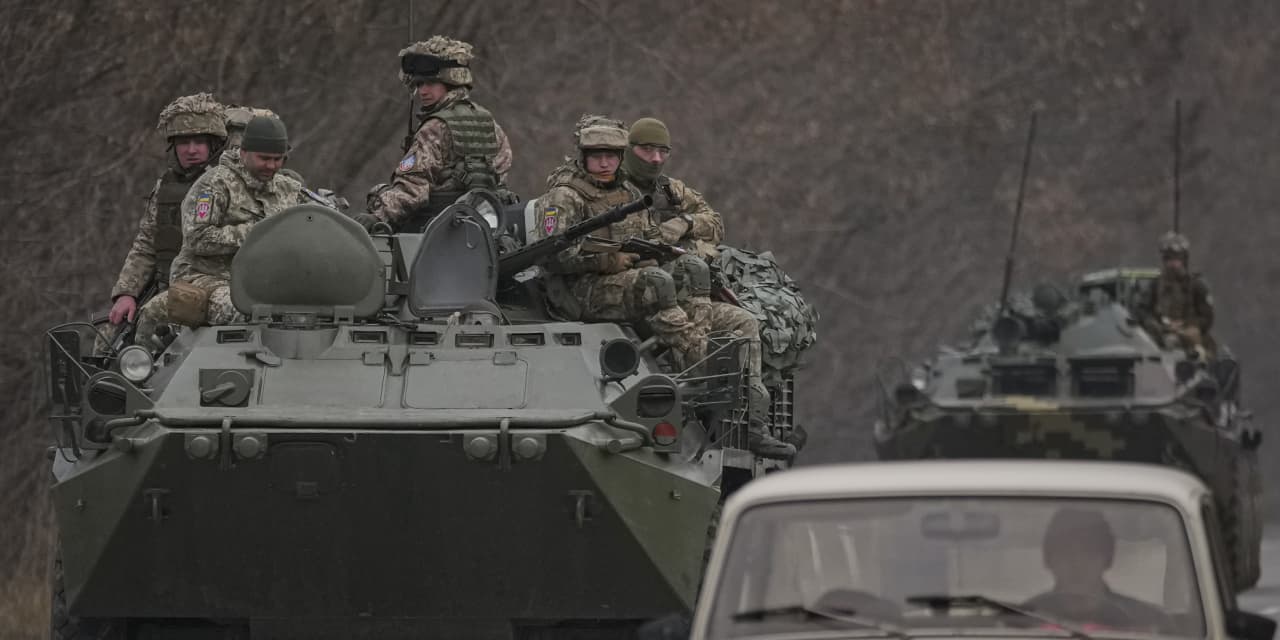 US stock futures fall amid Ukraine invasion jitters, despite late rally on Wall Street