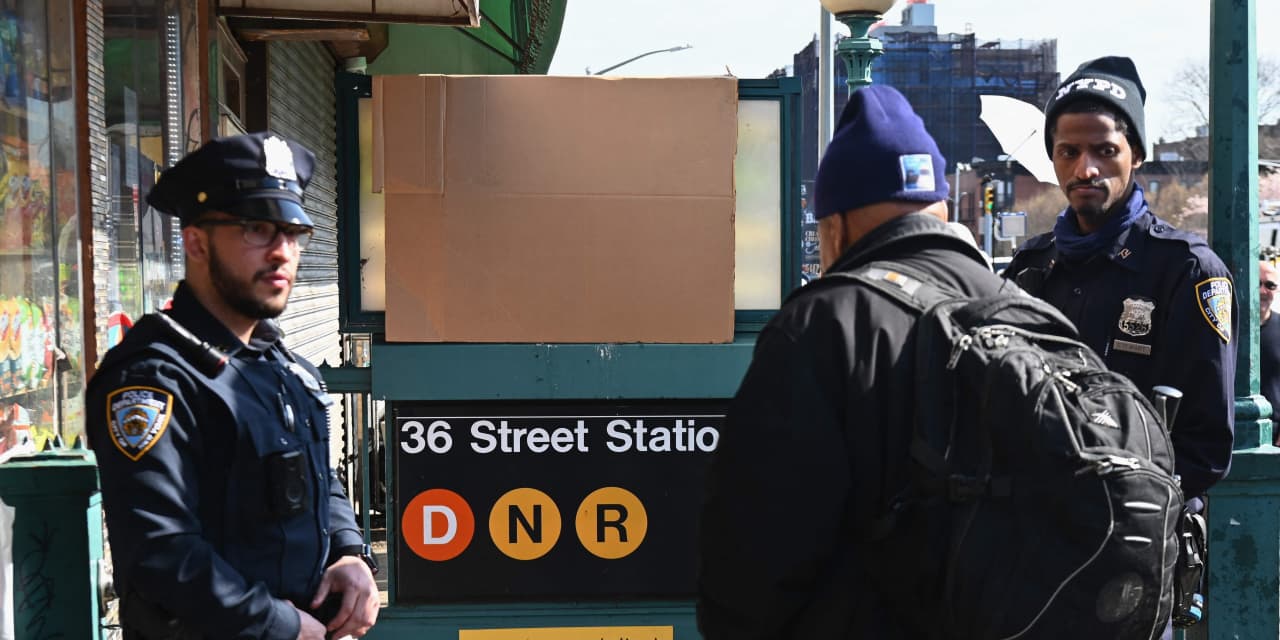 Manhunt continues as New York police formally name suspect in subway ...