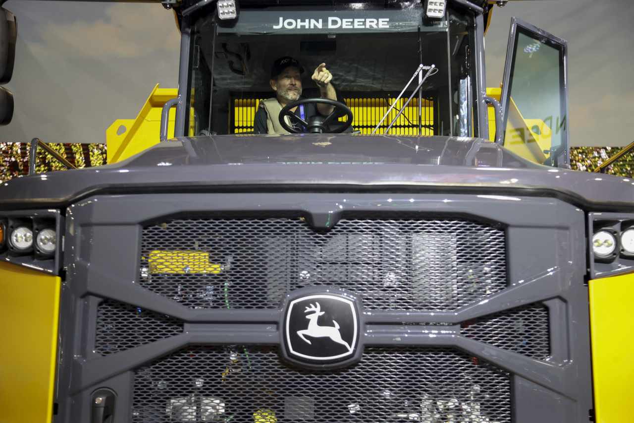 Deere’s stock slides as earnings fall sharply and guidance is for more pain ahead