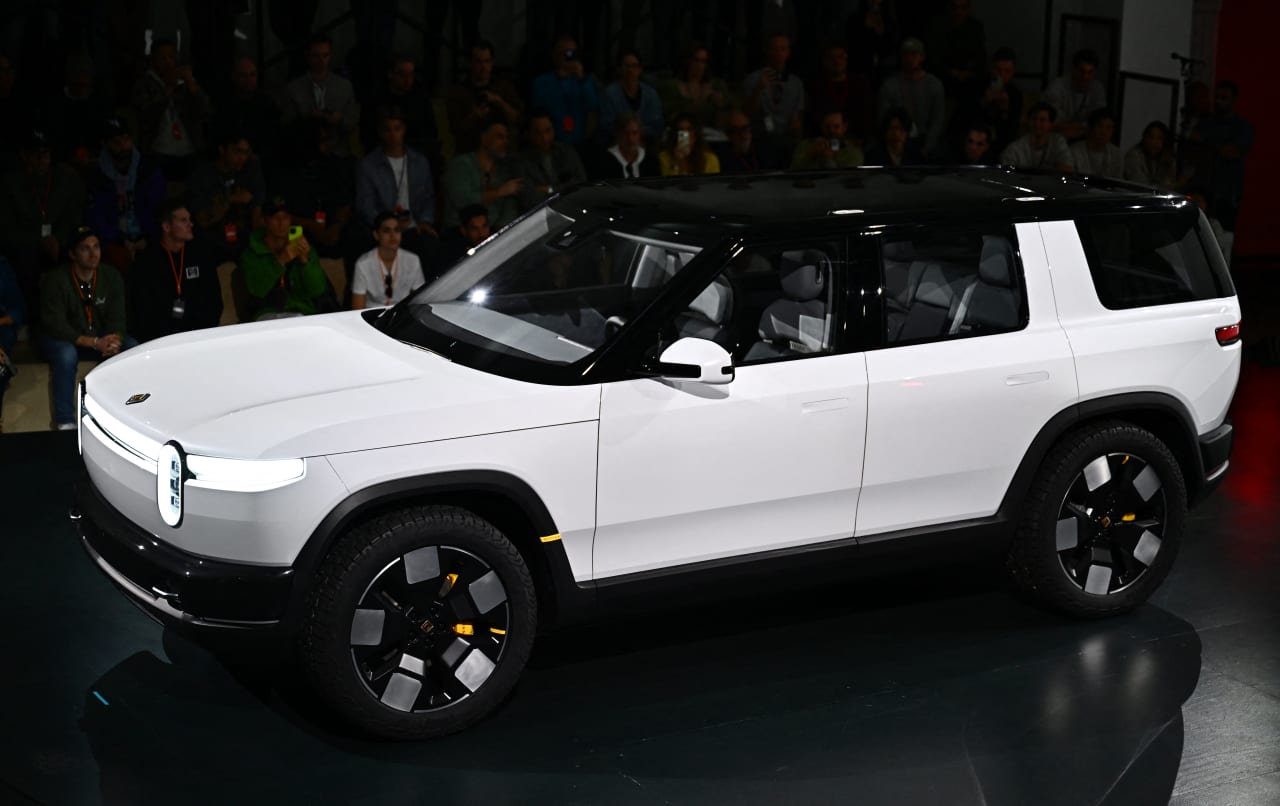 Rivian’s losses widen and stock falls 5%, but execs see profit outlook improving