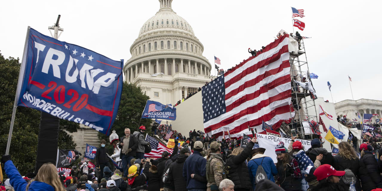 Americans see threat to democracy as No. 1 issue, support Trump probe, poll find..