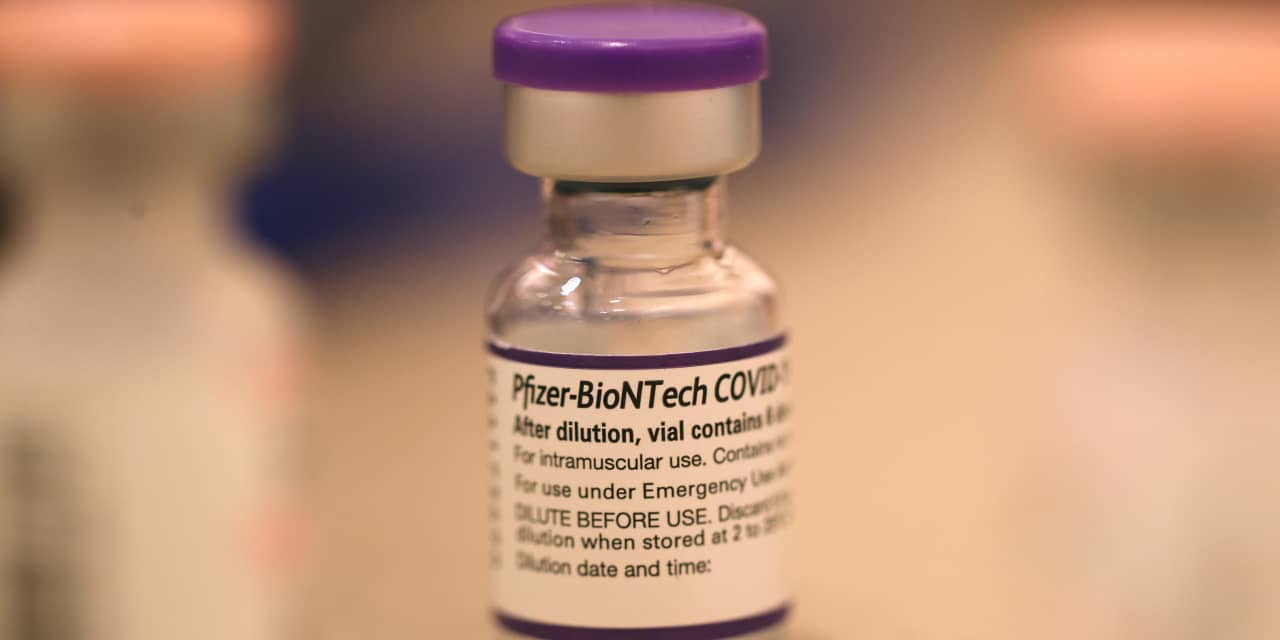 Pfizer booster improved to fight omicron, as hospitalizations rise to 3-month high