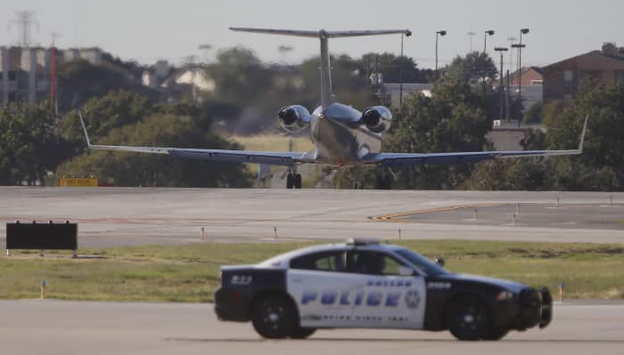 Woman fires gun at ceiling inside Dallas airport; officer shot her