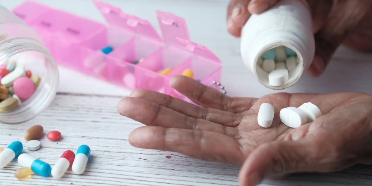 War over drug-cost assistance traps sickest patients in the middle