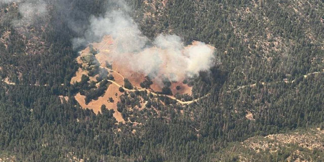 Heat, wind threaten to whip up growing Western wildfires