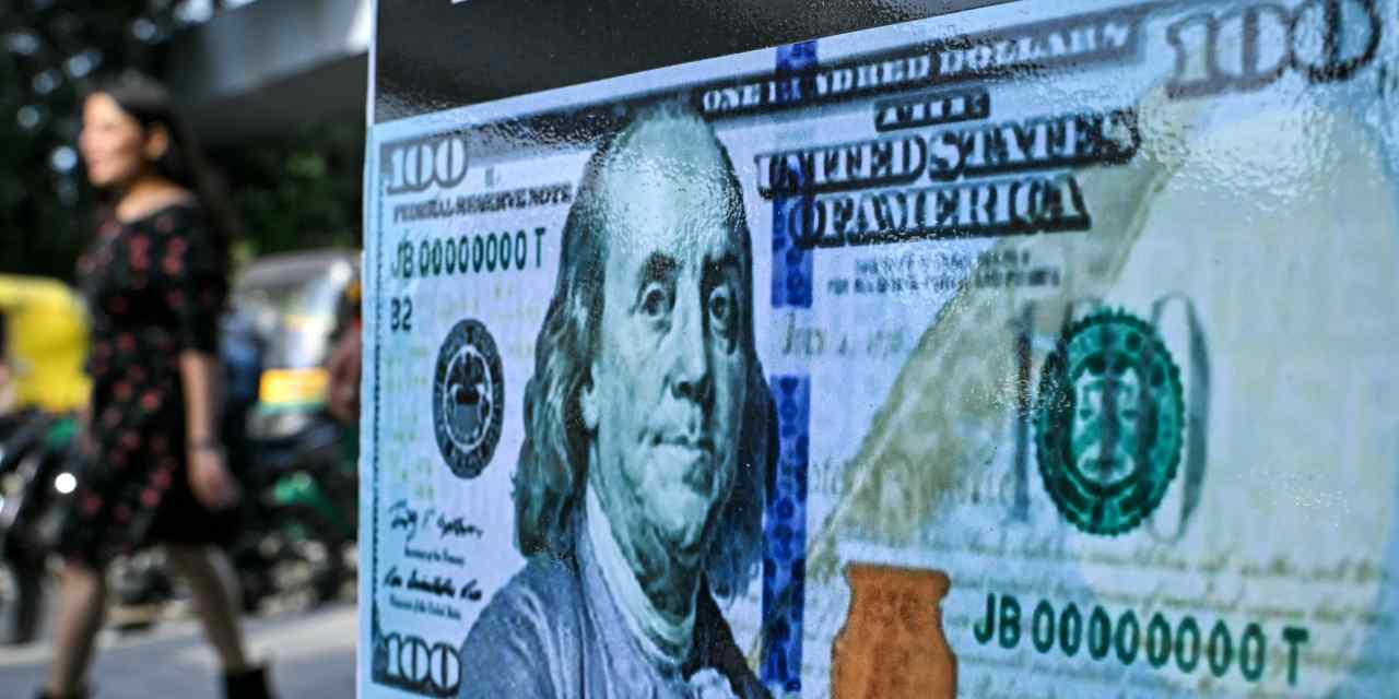 What the dollar’s retreat from global dominance means for investors as gold hits new records