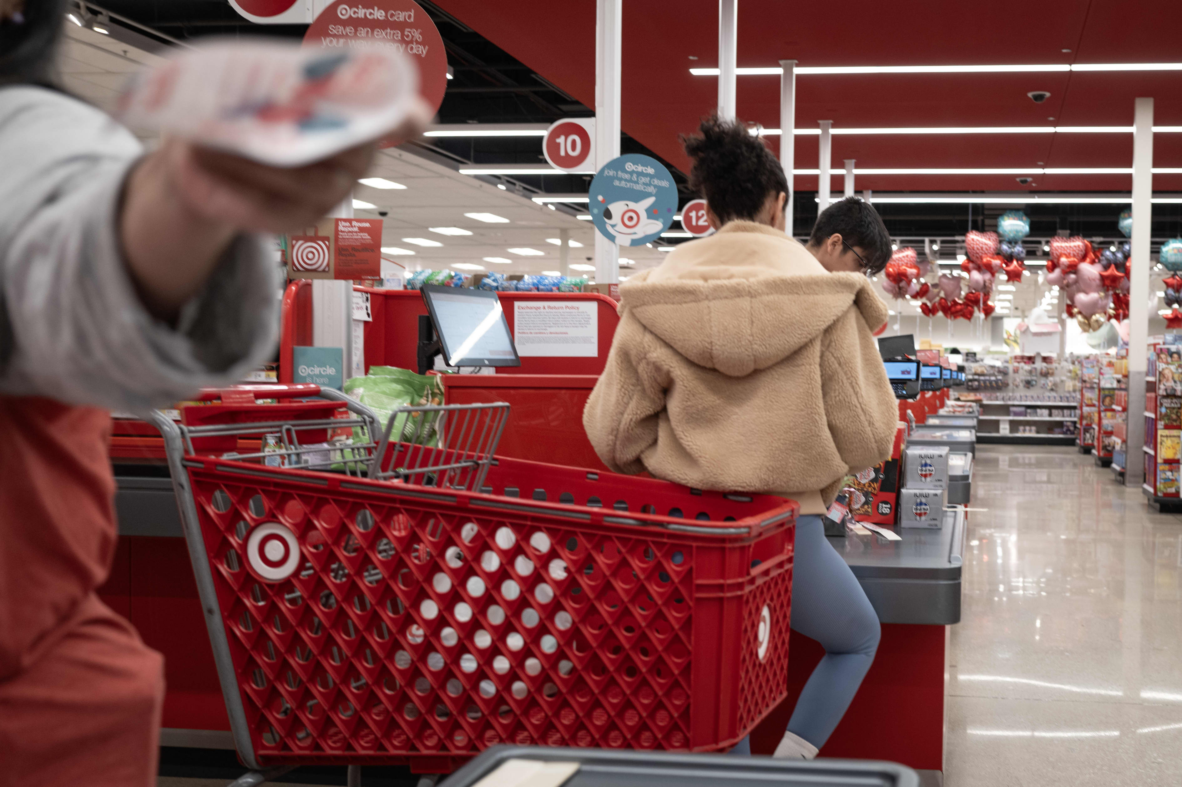 Customers shop at a Target store.