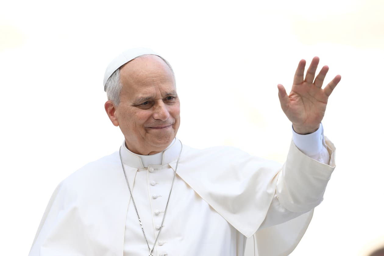 Image 4: Pope Leo XIV waves as he leaves St. Peter's Square.