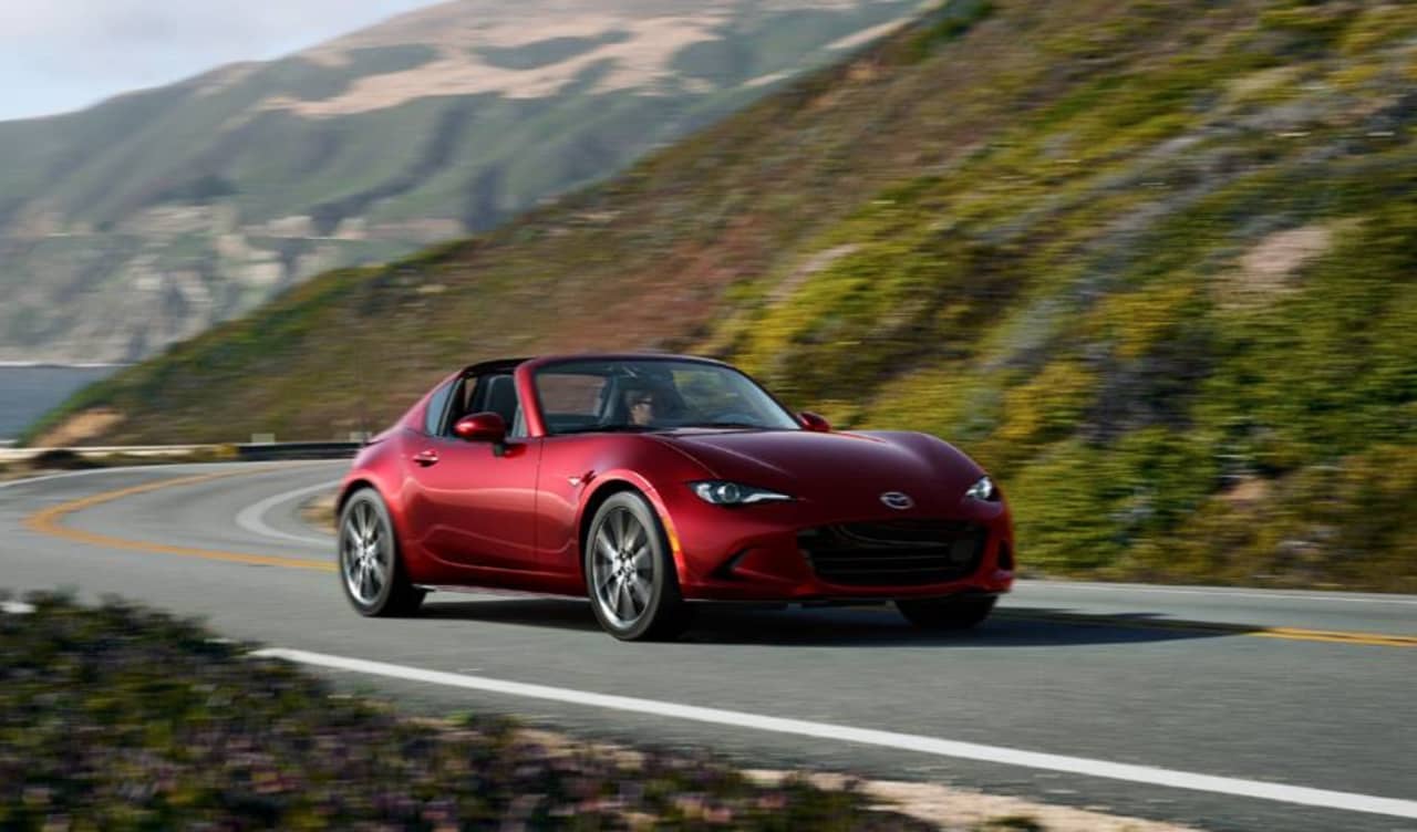 Introducing the 2024 Mazda MX-5 Miata, an affordable sports car that delivers driving pleasure.