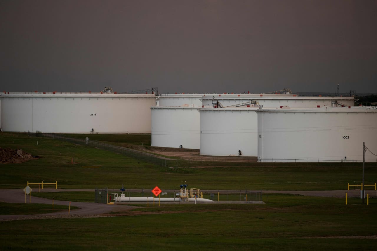 U.S. oil prices touch eight-week lows, then turn higher as U.S. crude supplies fall