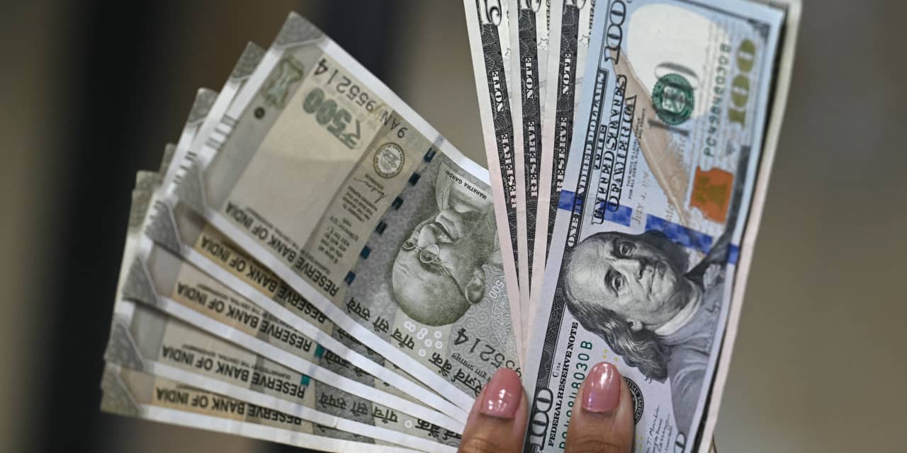 Dollar slides to 4-month low on efforts to boost the yen, which could spell trouble for U.S. equities