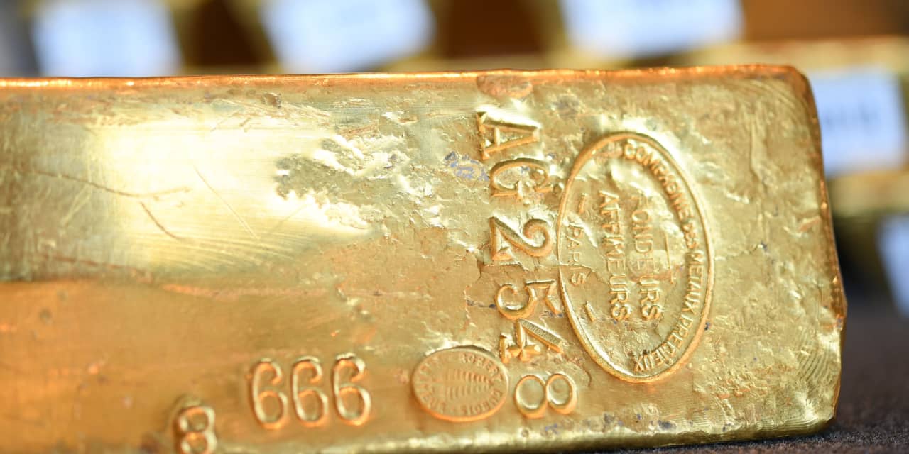 Gold tops $1,700 an ounce; silver settles at highest since June -  MarketWatch