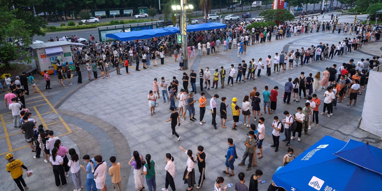 Manufacturing hub Guangzhou is latest Chinese city to face lockdowns as COVID cases rise