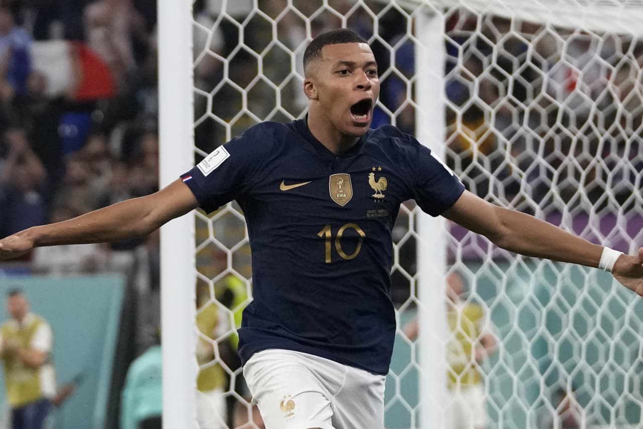 France reaches knockout stage of World Cup after Mbappe scores 2