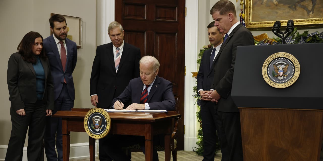 Biden signs bill preventing rail strike into law